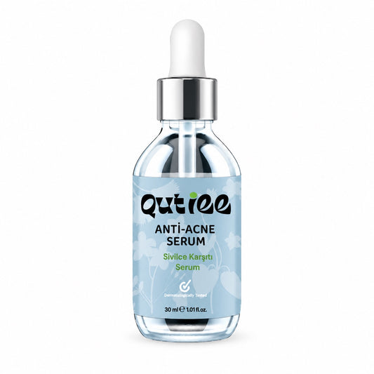 Qutiee anti-acne serum bottle with dropper on a white background