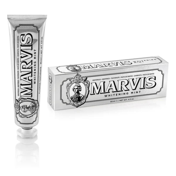 Marvis whitening mint toothpaste tube and packaging on a white background