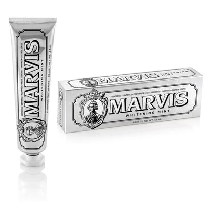 Marvis whitening mint toothpaste tube and packaging on a white background