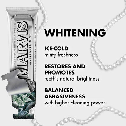 Marvis whitening toothpaste tube with pearl necklace on a white background