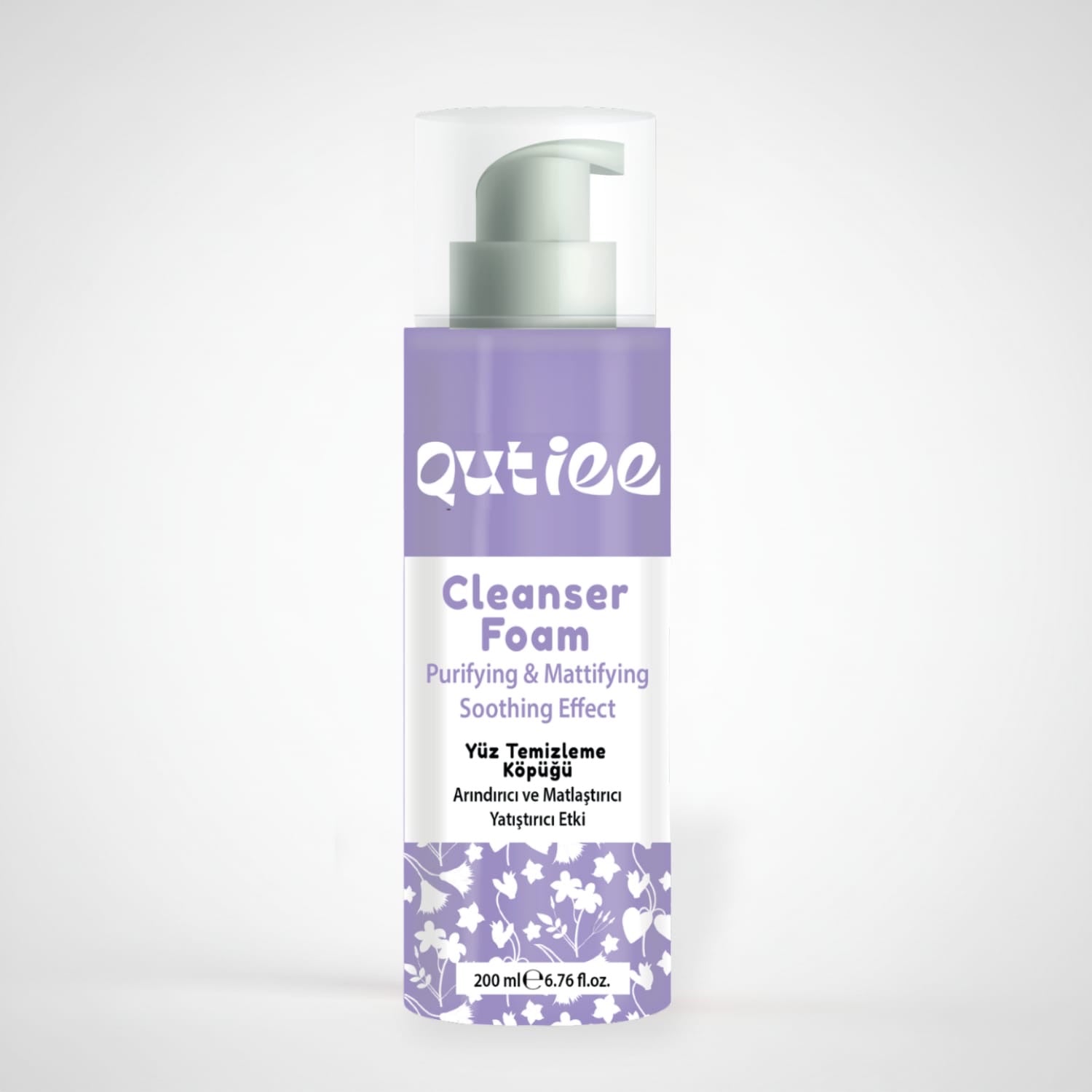 Qutiee Cleanser Foam bottle with purple and white design on a light gray background