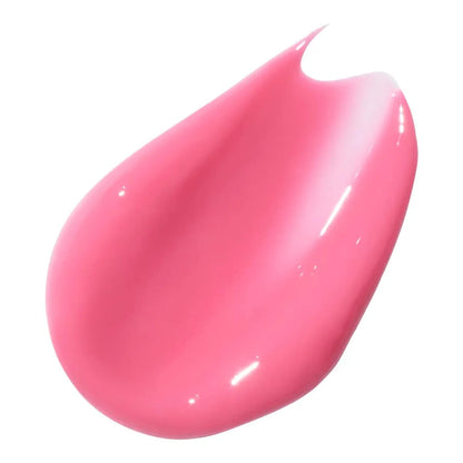 Pink lip serum droplet on a white background