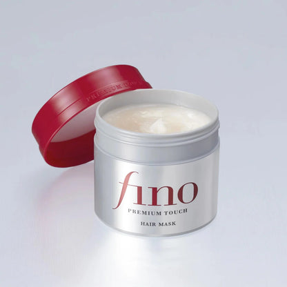Fino Premium Touch hair mask jar with red lid on a light gray background