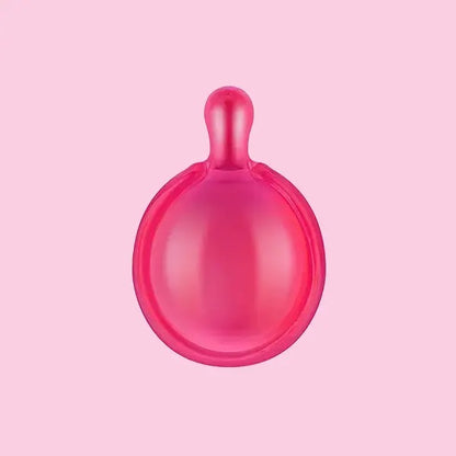 Pink silicone cup on a pink background