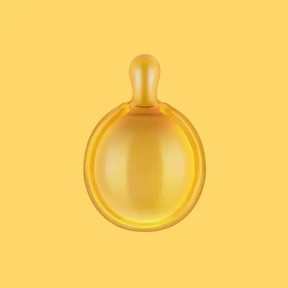Yellow hair capsule on a yellow background