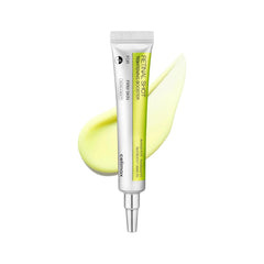 Skincare serum tube with a white cap and green label on a white background
