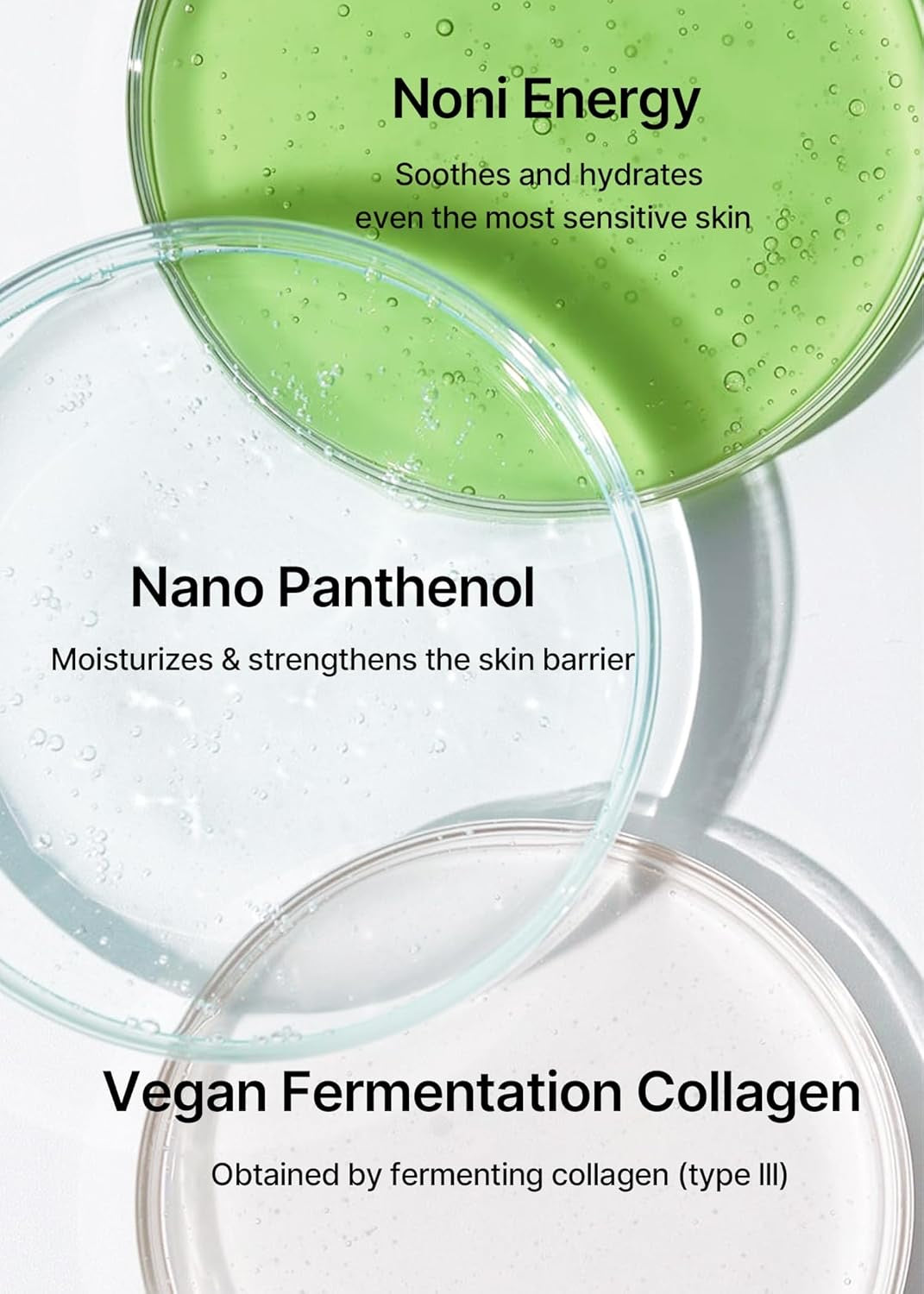 Cosmetic product with green and clear gel-like texture, labeled 'Noni Energy', 'Nano Panthenol', and 'Vegan Fermentation Collagen'.