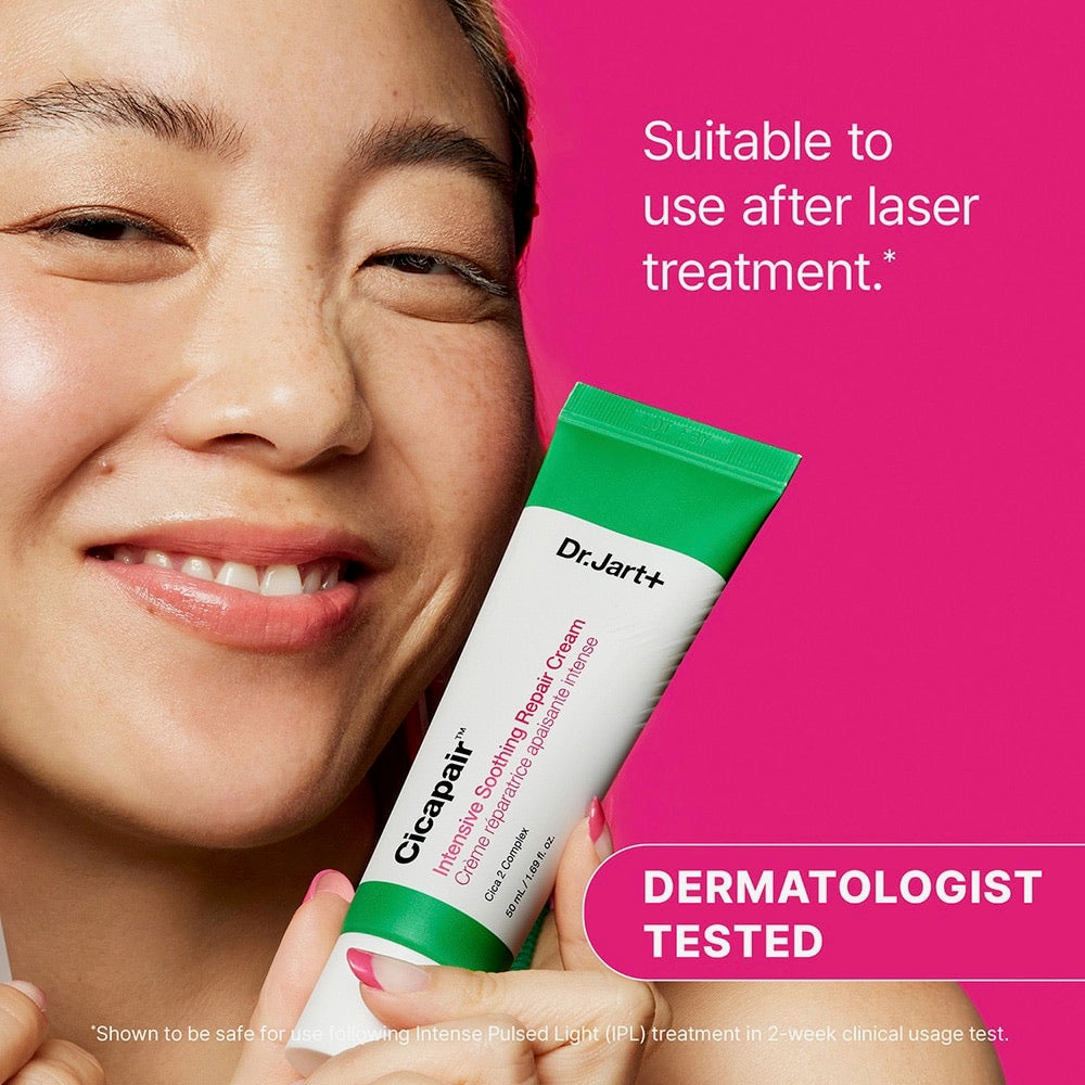 Woman holding a Dr. Jart+ Cicapair cream against a pink background