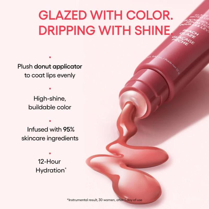 Lip gloss tube with pink lip gloss spilling out, text highlighting features on a white background