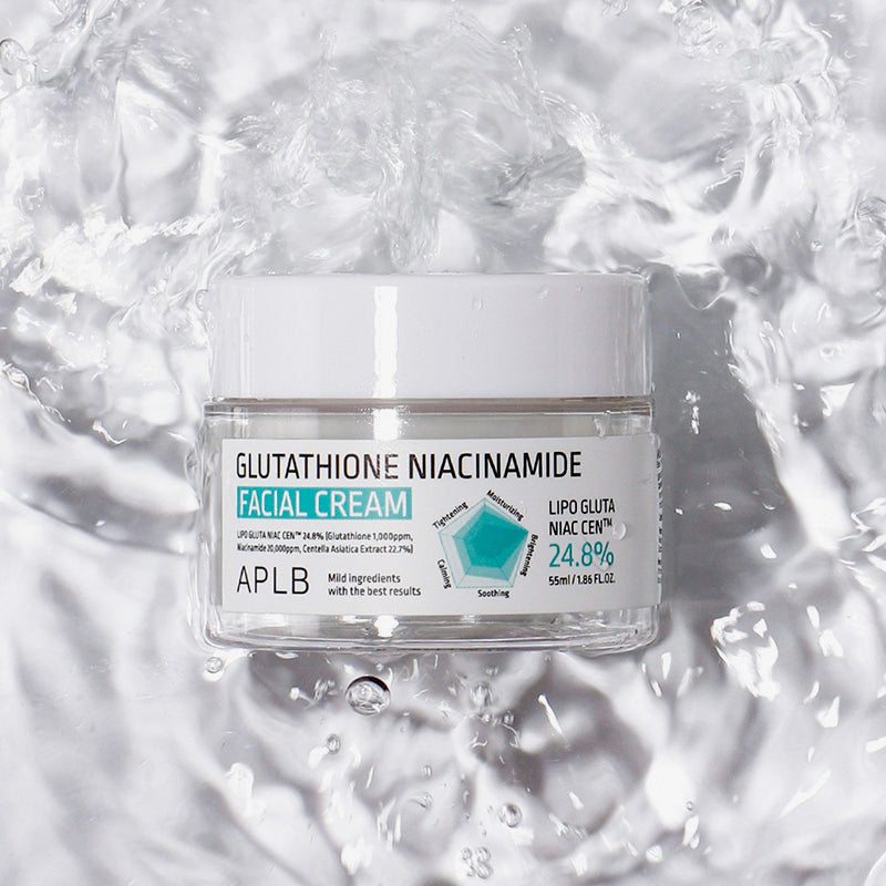 Facial cream jar labeled 'Glutathione Niacinamide' on a water background