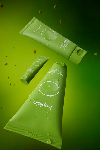 Two green tubes of 'bepalin' cream on a green background