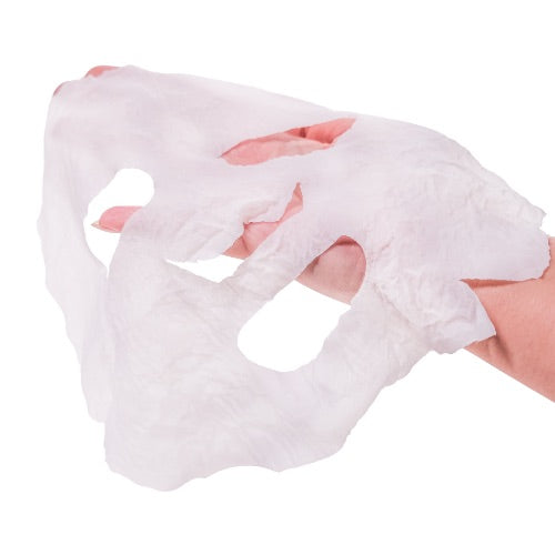 White face mask being worn on a person's face with a white background