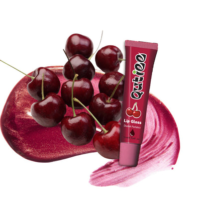 Lip gloss with cherry design and cherries on a white background