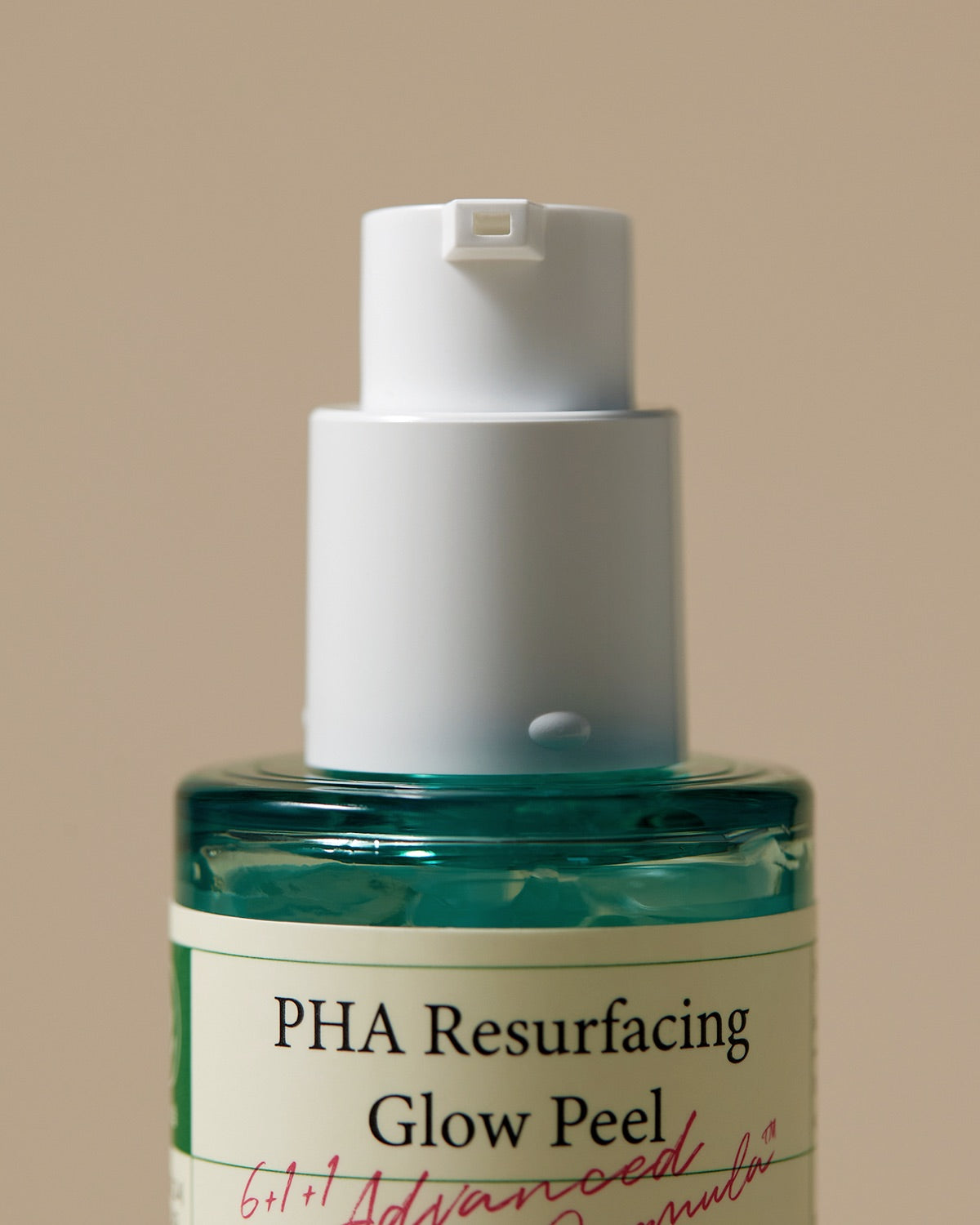 Skincare product labeled 'PHA Resurfacing Glow Peel' on a beige background