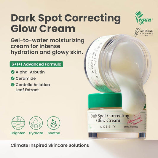 AXIS-Y Dark Spot Correcting Glow Cream with packaging and product application on beige background