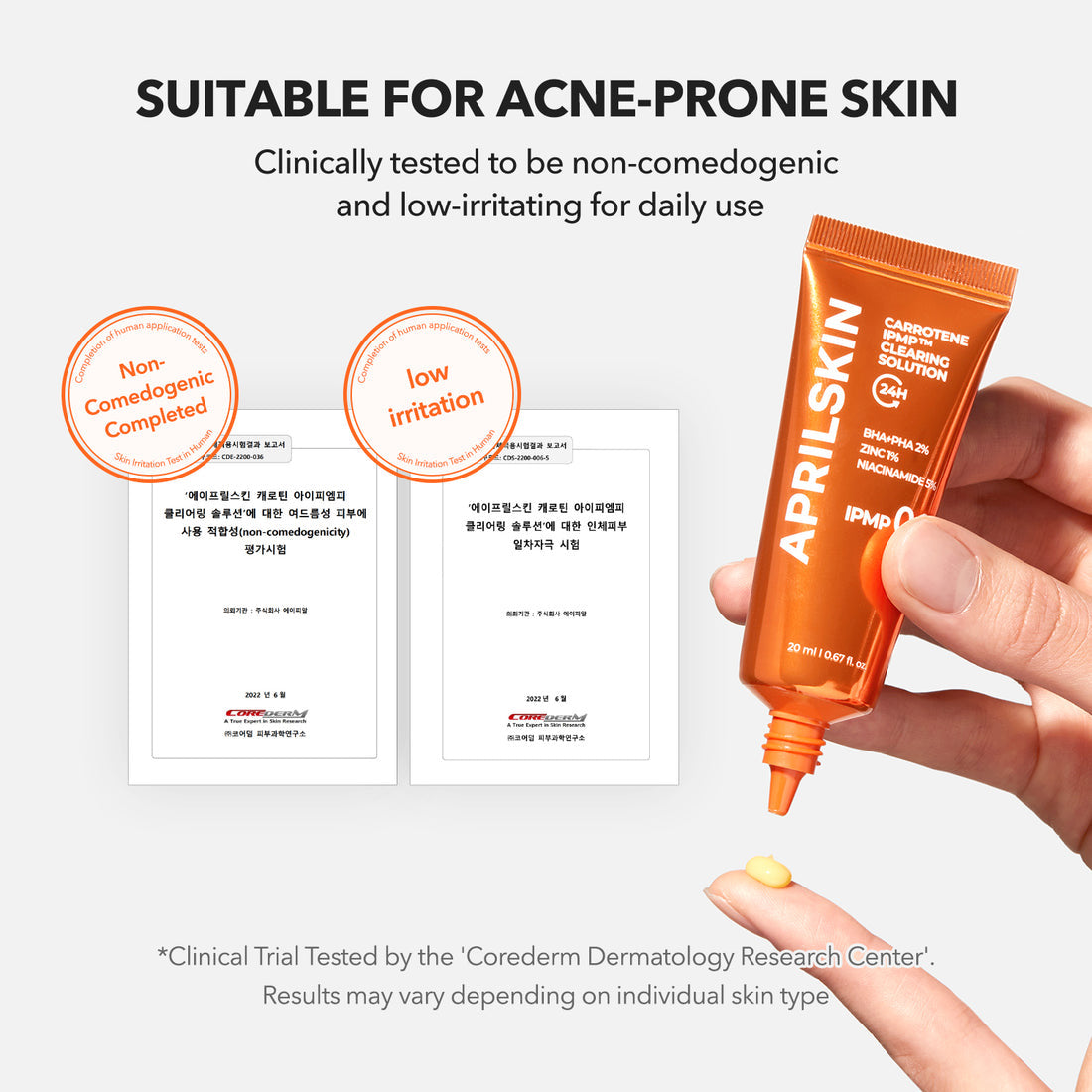 Orange skincare product tube held by a hand with text about suitability for acne-prone skin.