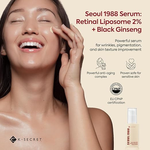 Woman applying Seoul 1988 Serum to her face with product packaging on a beige background