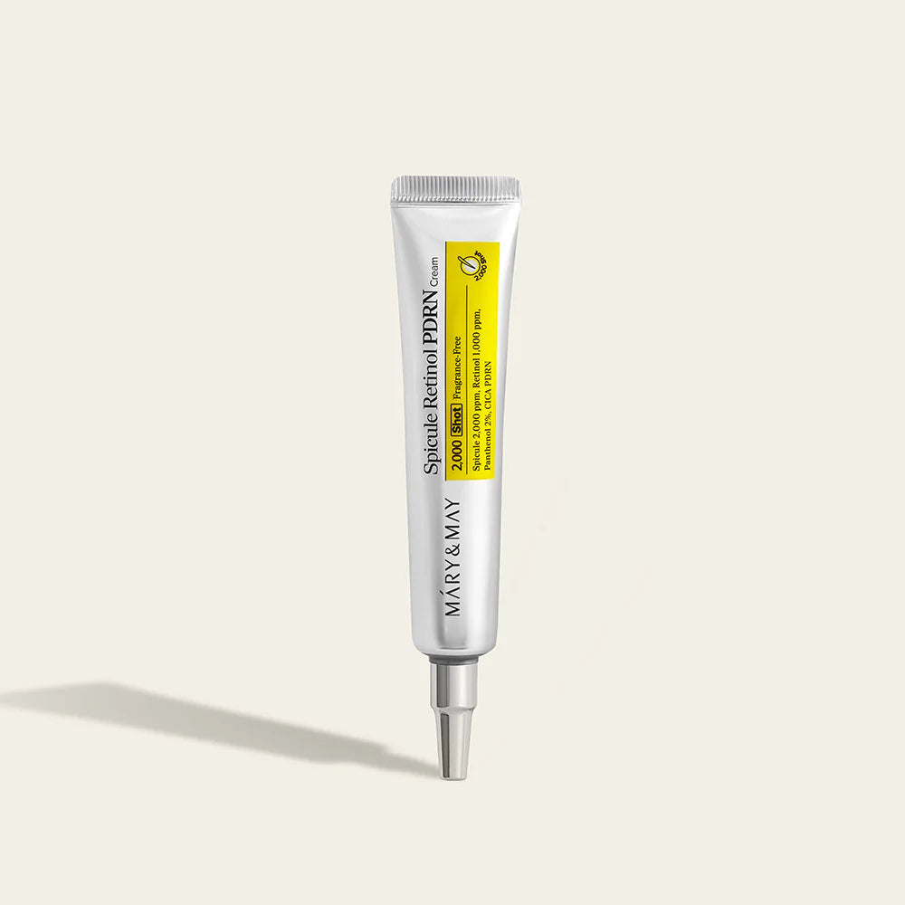 Skincare tube with a yellow label on a white background
