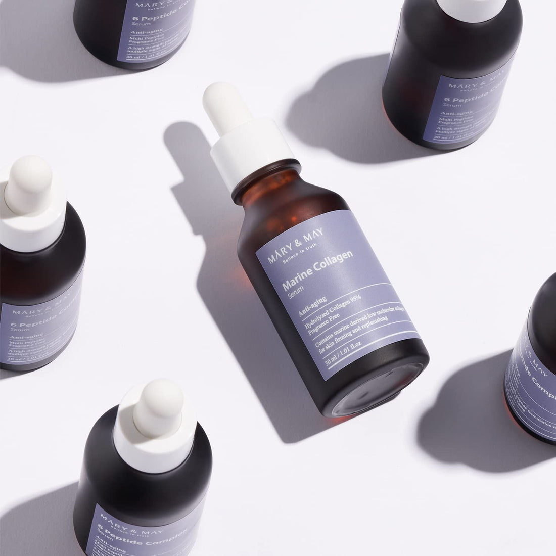Bottle of 'Mary & Max Marine Collagen' on a white background