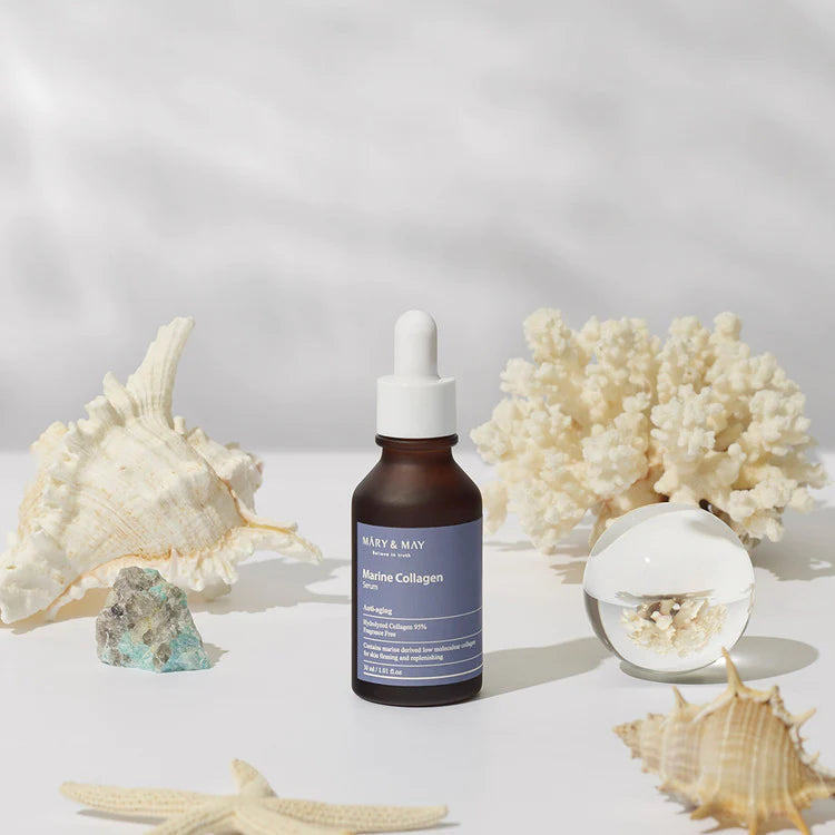 Marine collagen dropper bottle with natural elements on a light background