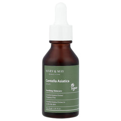 Skincare serum bottle with green label on a white background