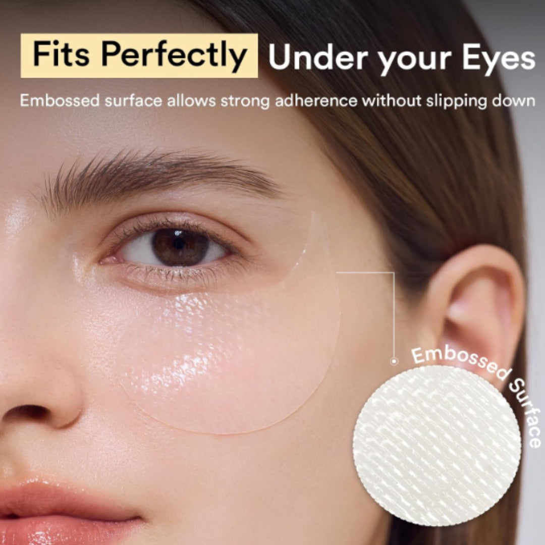 Eye patch with embossed surface on a person's eye, highlighting its fit and adhesive properties.