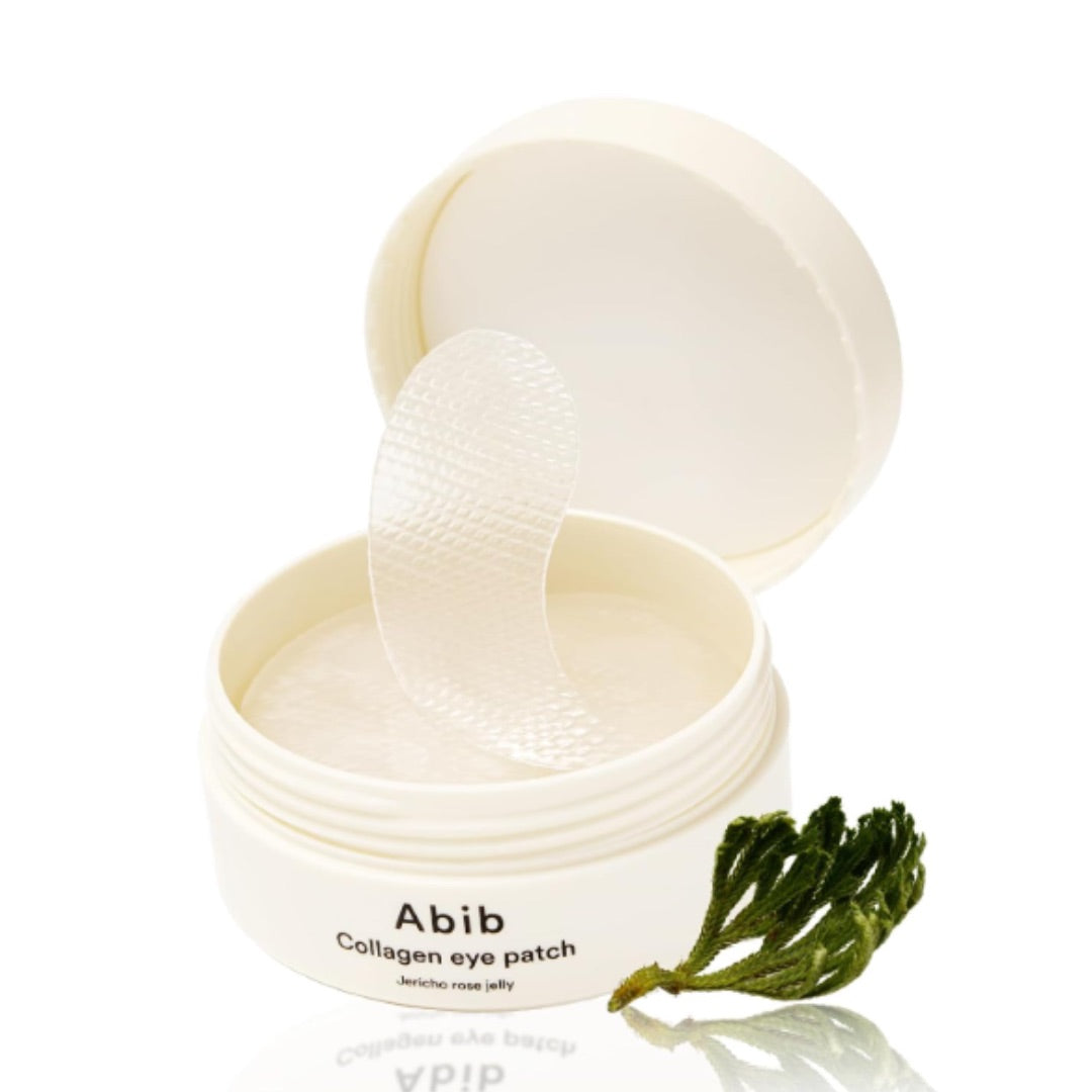 Collagen eye patch container with a green leaf on a white background