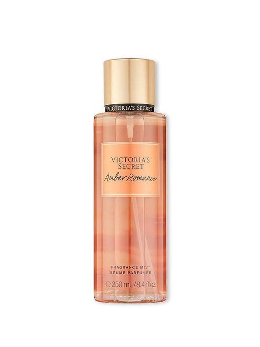 Victoria's Secret Amber Romance fragrance mist bottle on a white background