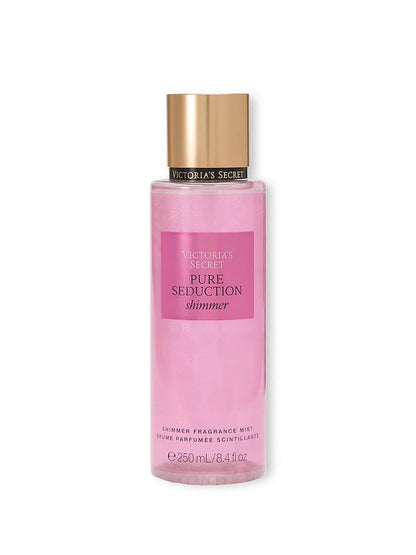 Pink bottle of Victoria's Secret Pure Seduction shower fragrance mist on a white background