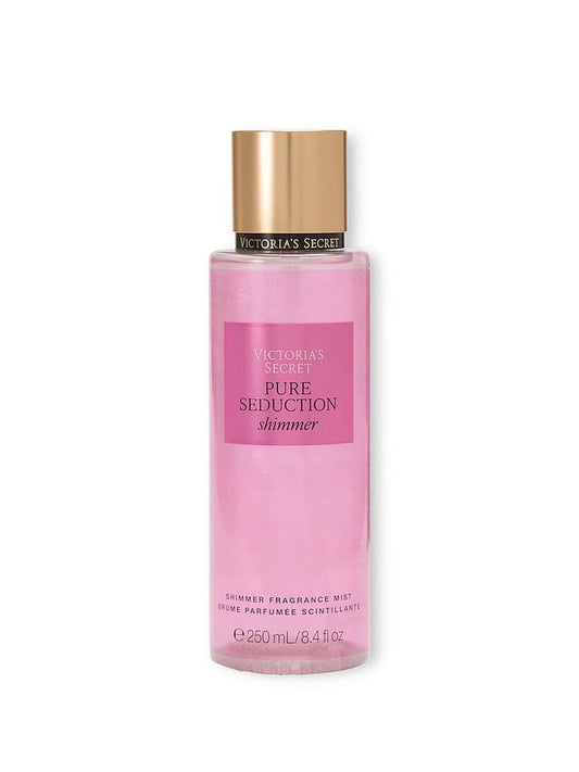 Pink bottle of Victoria's Secret Pure Seduction shower fragrance mist on a white background